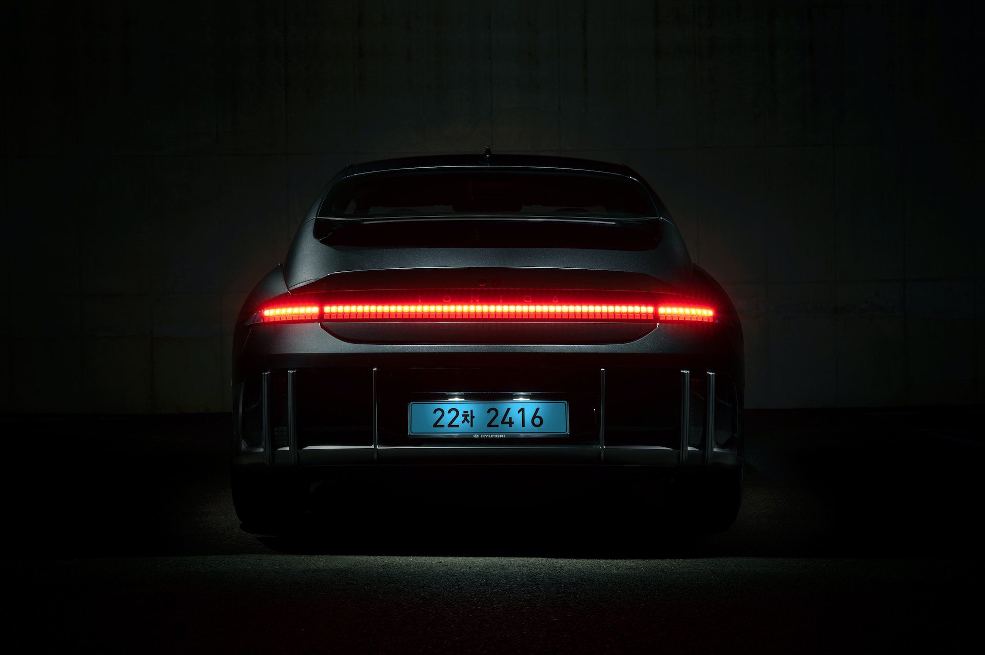 car with red neon backlight