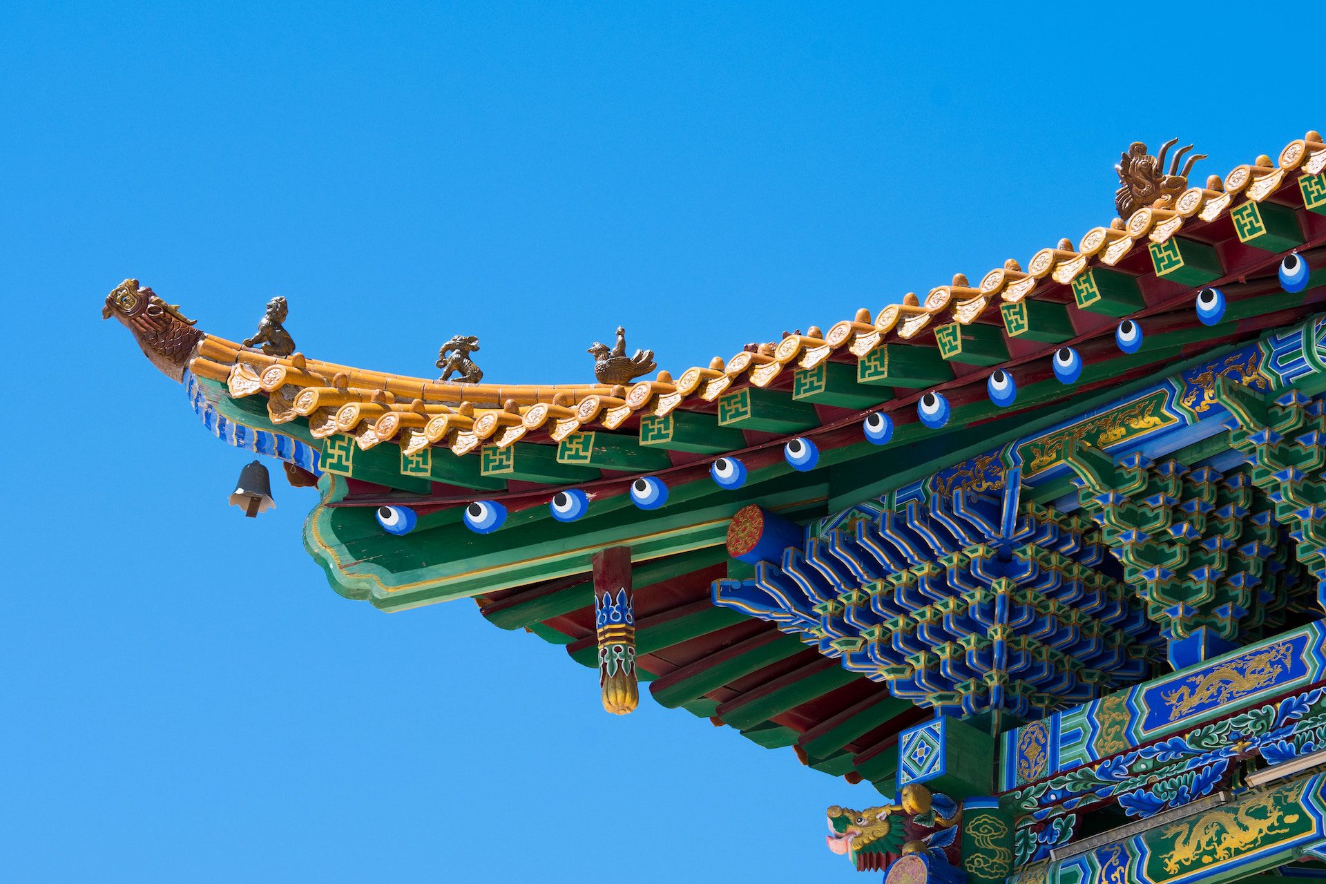 close up shot of a colourful temple with a sky blue background