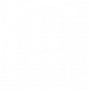 a white circle with white text 20 yrs in carbon markets